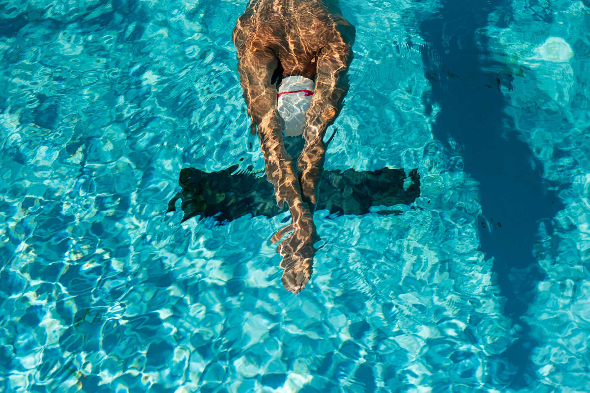Essential Swimming Equipment: Swimsuit, Goggles, Swim Cap, Fins